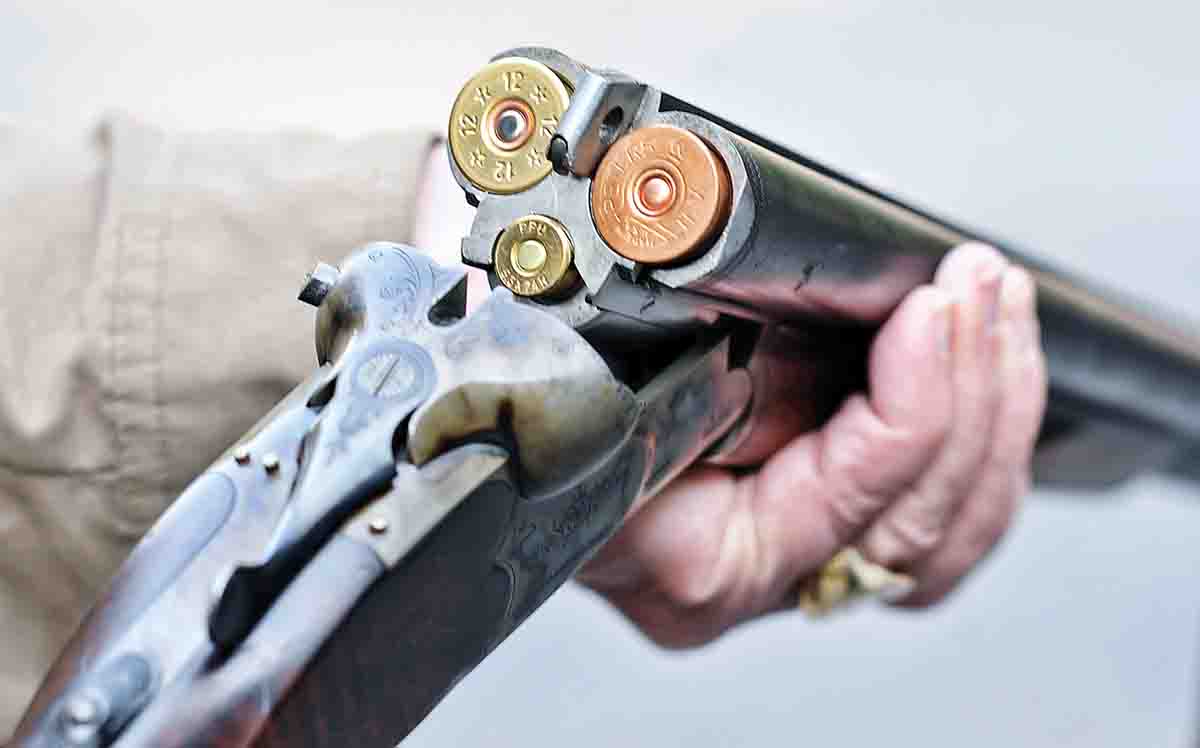 A typical German combination gun with both rifle and shot barrels, a safety catch that doubles as a barrel selector, cocking indicators and sights that pop-up when the rifle barrel is selected. Such complex, ingenious and beautifully made guns have been a German specialty for 170 years.